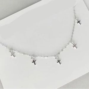 NEW! Sterling Silver Necklace with Dangling Crosses.